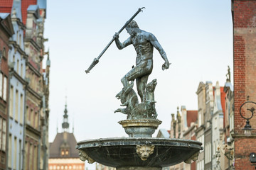 Beautiful Neptune fountain at dawn - symbol of Gdansk, Poland