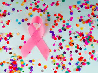 pink ribbon on multicolored background,Breast cancer awareness concept