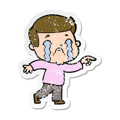 Obraz premium distressed sticker of a cartoon man crying