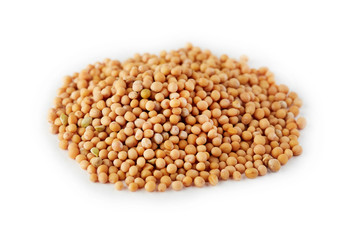 Organic yellow mustard seeds isolated on white background