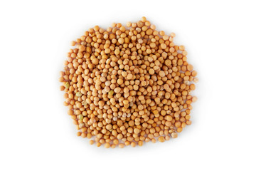 Organic yellow mustard seeds isolated on white background