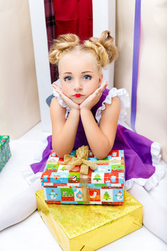 little girl doll with gifts