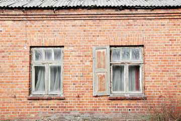 Fototapeta na wymiar old window on brick wall