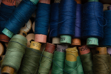 group of multicolored threads top view