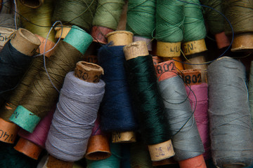 group of multicolored threads top view