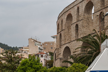 Fototapeta na wymiar Ruins of medieval aqueduct in city of Kavala, East Macedonia and Thrace, Greece