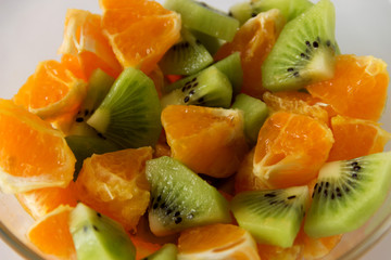 Fruit salad from kiwi and tangerines.