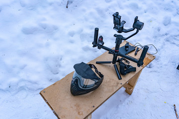 Paintball mask and a 3 axis gimbal on a bench