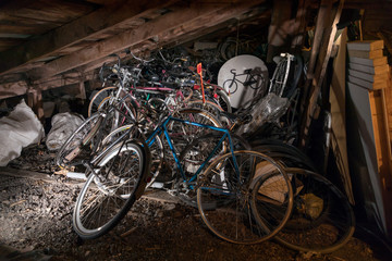 Abandoned, old bicycles in an atiic in Riga