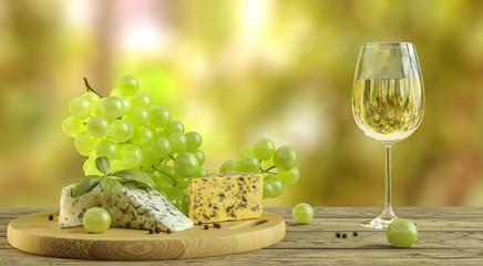 White wine, cheese and grapes on wooden table with blurred wineyard in background, living in countryside, organic, natural, producing your own food, ecology, lifestyle choice