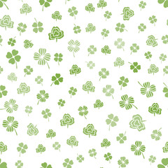 Green on white hand drawn Irish shamrocks background in a stylized modern style.