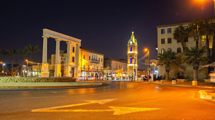 Fototapeta na wymiar Old Jaffa clock tower town square at night