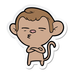 sticker of a cartoon suspicious monkey