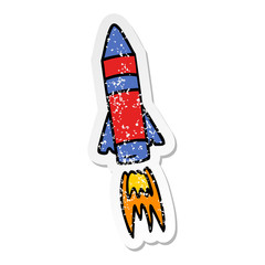 distressed sticker cartoon doodle of a space rocket