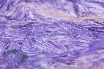 Top grade Charoite polished slab from Sakha Republic, Siberia, Russia like art background, texture. Charoite Jade.