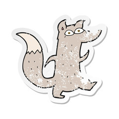 retro distressed sticker of a cartoon cute wolf