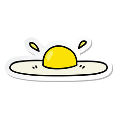 sticker of a quirky hand drawn cartoon fried egg