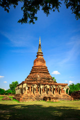 Naklejka premium Wat Chang lom which has old-style pagoda with elephant statues around sukhothai historical park in Thailand., Tourism, World Heritage Site, Civilization,UNESCO