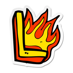 sticker of a cartoon flaming letter