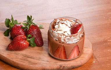 chocolate and strawberries  waffles on wooden board