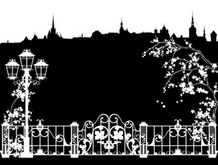 tallinn city skyline with blooming cherry tree branches, fence  and street light - black and white vector silhouette design (editable elements)