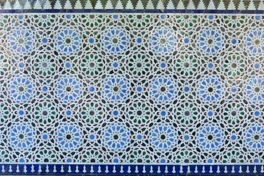 Arabic pattern on a tiled wall of a Muslim building, abstract background and texture