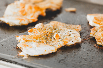 Golden chicken cooked on the grill