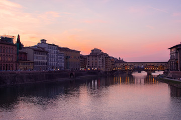 florence,tuscany/Italy 20 february 2019 : the ponte vechio bridge snapshot taken at golden hour beautiful colors and excellent architecture