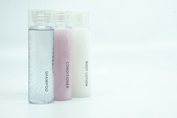 Hotel toiletry, shampoo, conditioner and body lotion.