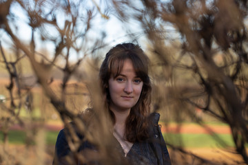 portrait of young woman in autumn park