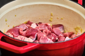 Cooking meat and onion