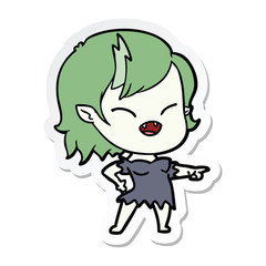 sticker of a cartoon vampire girl pointing and laughing