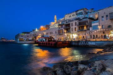 Fototapeta premium Old jaffa port and St. Peter's Church background.