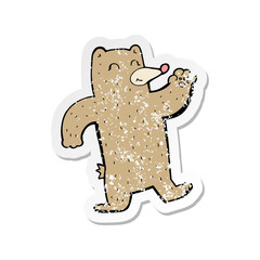 retro distressed sticker of a cartoon waving bear