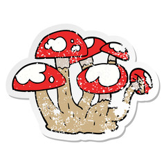distressed sticker of a cartoon mushrooms