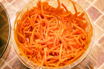 Chopped carrots in food plastic container