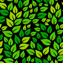 Fresh green leaves on black spring season seamless pattern, vector