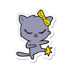 sticker of a cute cartoon cat with bow