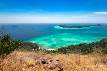 A top view of Koh Lipe island in Thailand ,surrounding with the crystal clear water and white sand beach.