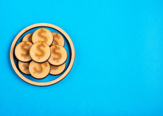 Savings concept with coins - Blue background. Text space