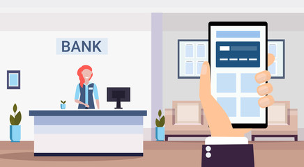 human using banking mobile application specialist at reception counter financial consulting center reception modern bank office interior horizontal flat