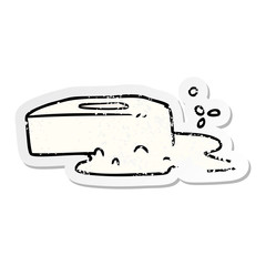 distressed sticker cartoon doodle of a bubbled soap