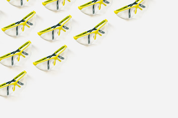safety glasses bright green on a white background. Pattern for your design