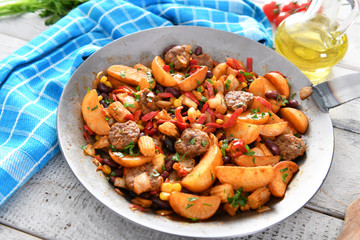 Vegetables from the pan with meat chunks