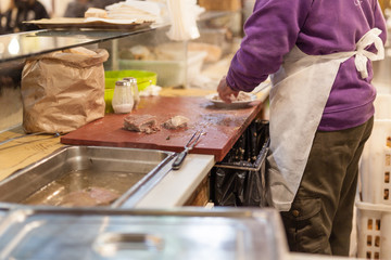 cooking street food at the street market