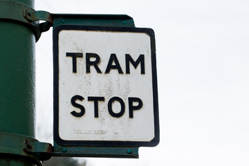 Old retro vintage rusty Tram Stop sign