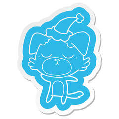 cute cartoon  sticker of a dog wearing santa hat