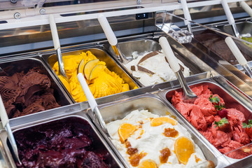 classic italian gourmet gelato gelatto ice cream display in shop