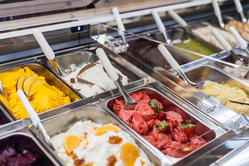 classic italian gourmet gelato gelatto ice cream display in shop