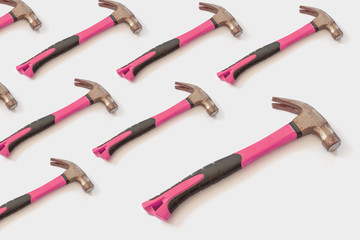 hammer with a pink handle on a light white background. Template